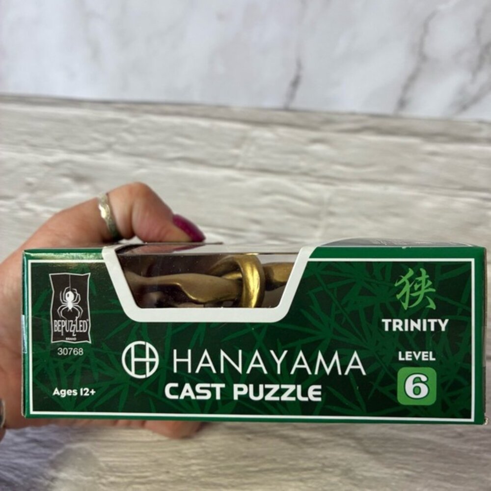 NIB Hanayama Cast Metal Brain Teaser Puzzles Vortex & Trinity Set of 2 - Picture 9 of 9